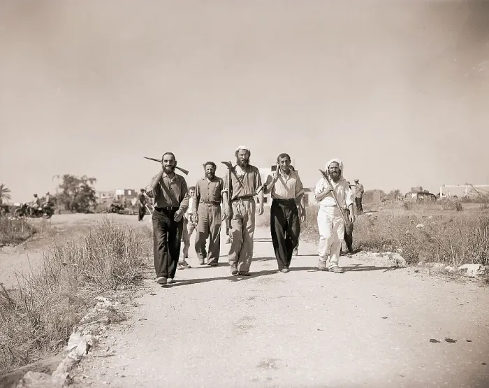 Framed Print : Men with Farm Tools Walk on Road Framed Print : Men with Farm Tools Walk on Road
