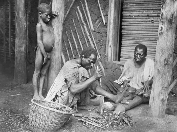 Framed Print : Men Fashioning Tools Framed Print : Men Fashioning Tools