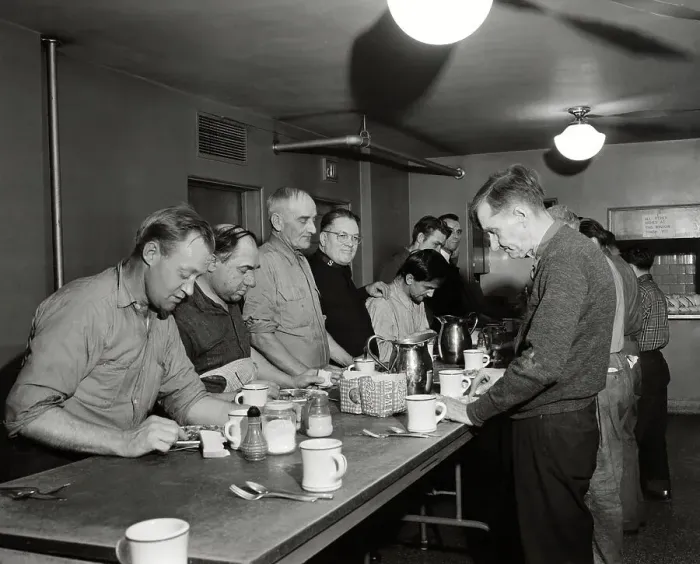 Framed Print : Men Being Fed A Meal at Salvation Army Site