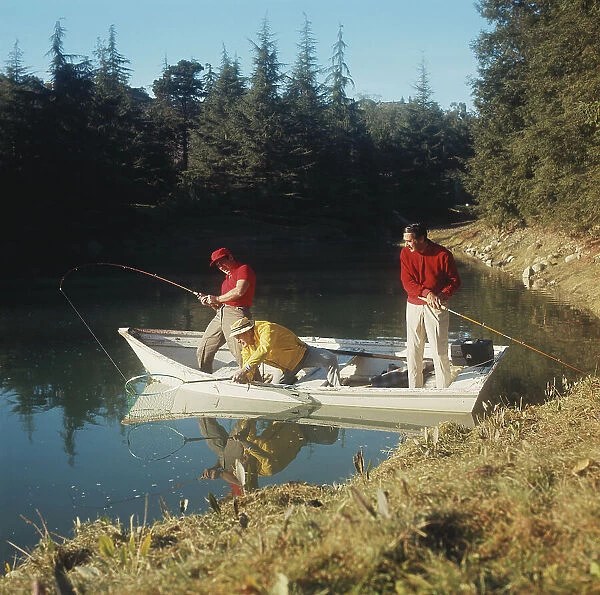 Men fishing in lake