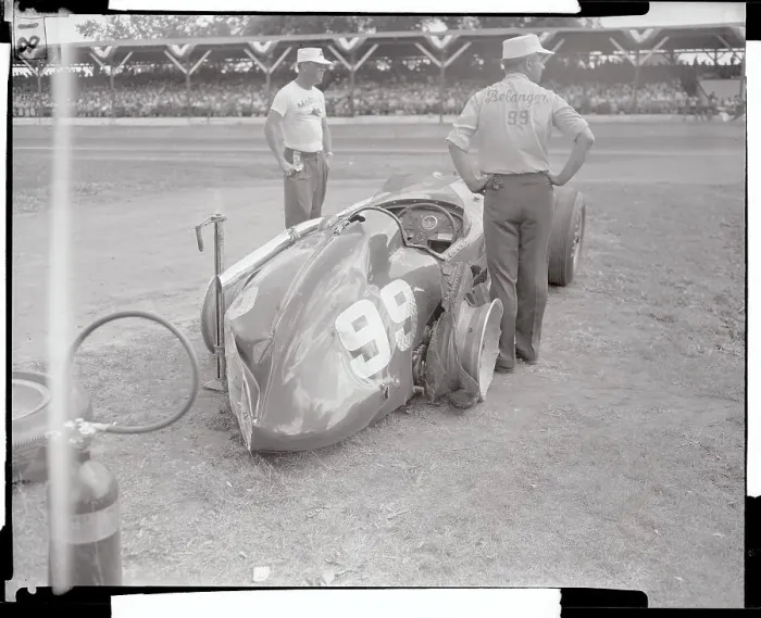 Framed Print : Men Gazing at Wrecked Race Car Framed Print : Men Gazing at Wrecked Race Car