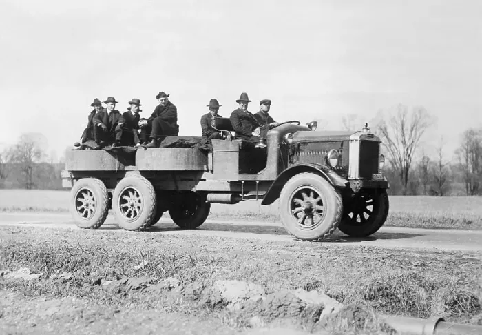 Framed Print : Men Giving Multiple Wheel Truck Road Test