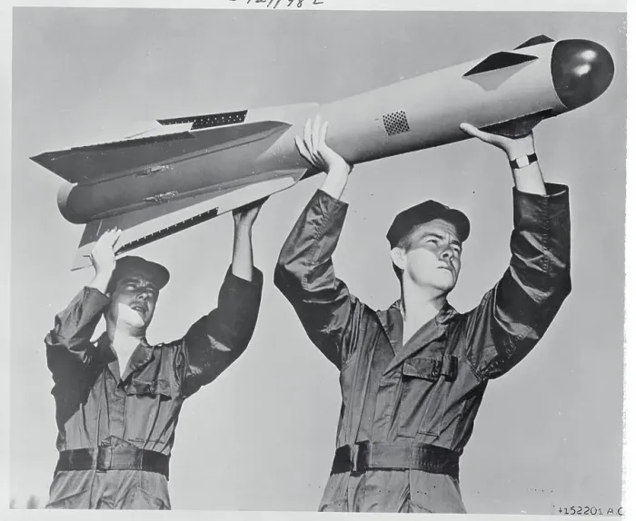 Framed Print : Two Men Holding a Falcon Missile Framed Print : Two Men Holding a Falcon Missile