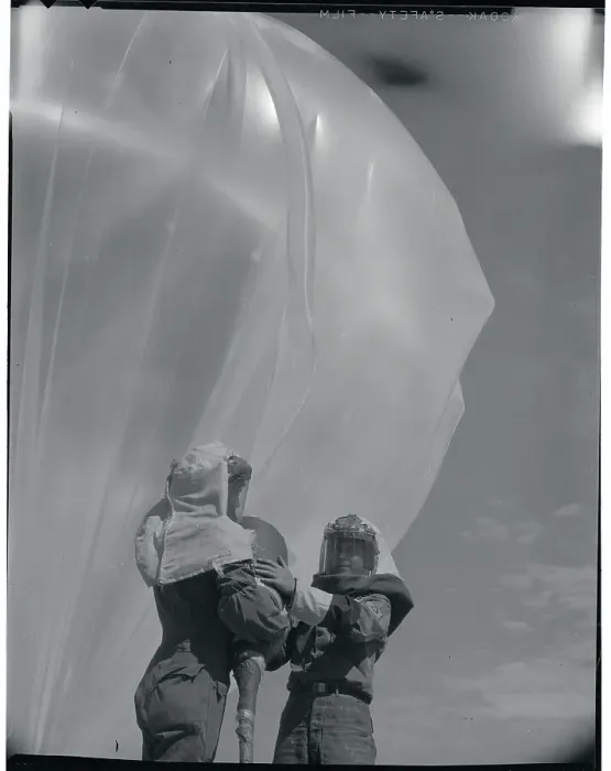 Framed Print : Men Inflating a Weather Balloon Framed Print : Men Inflating a Weather Balloon