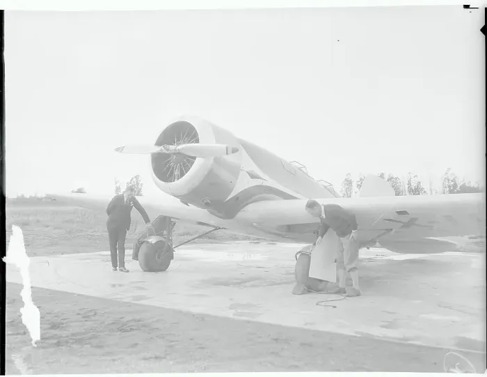 Framed Print : Men Inspecting New Lindbergh Plane Wing Framed Print : Men Inspecting New Lindbergh Plane Wing
