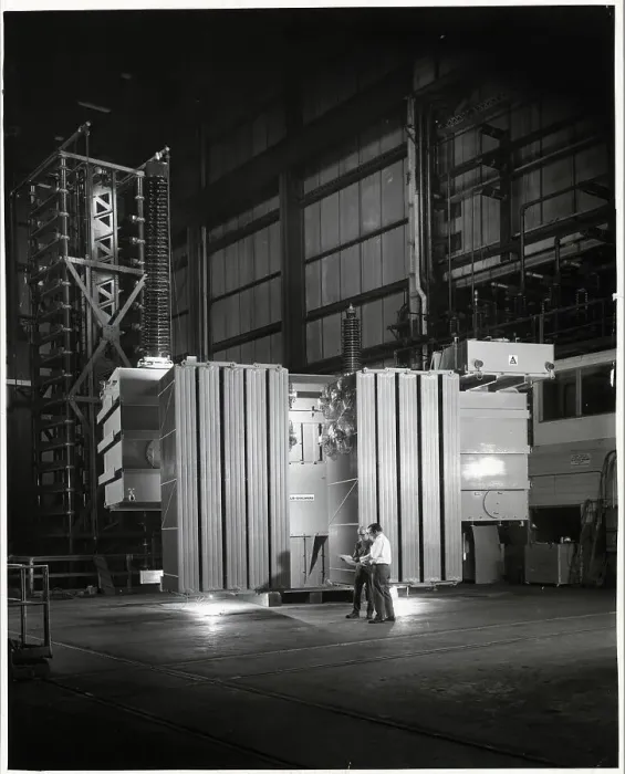 Framed Print : Men Inspecting Power Transformer Framed Print : Men Inspecting Power Transformer