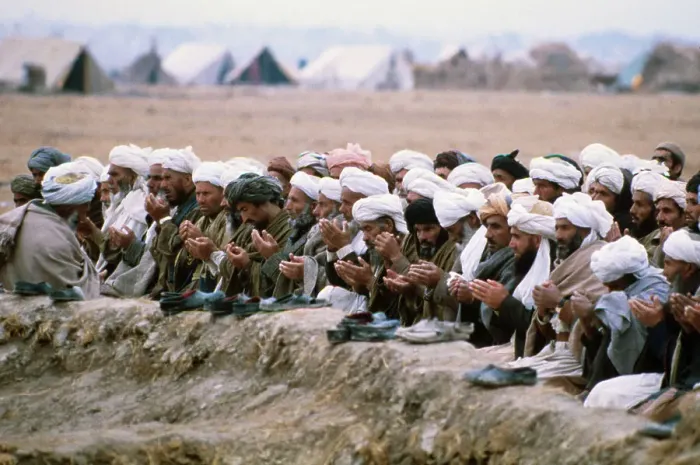 Framed Print : Men Kneeling on Ground in Afghanistan Framed Print : Men Kneeling on Ground in Afghanistan