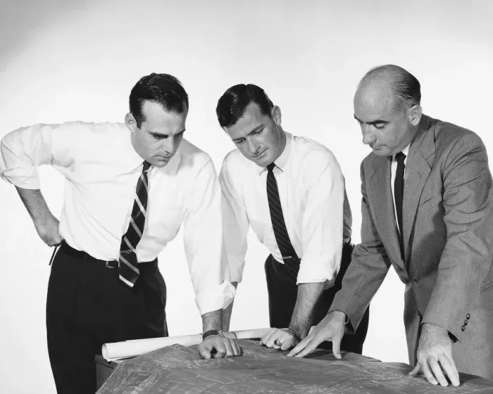 Framed Print : Three men looking at blueprints Framed Print : Three men looking at blueprints