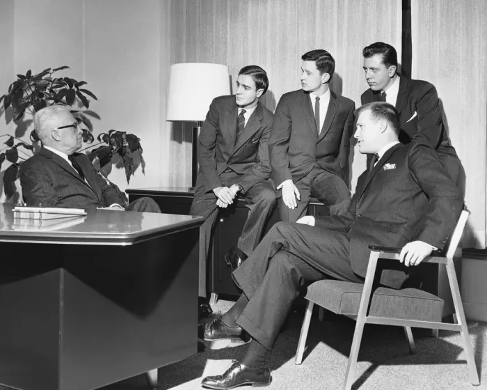 Framed Print : Men looking at group in meeting Framed Print : Men looking at group in meeting