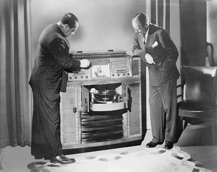 Framed Print : Men Looking at Television and Radio Framed Print : Men Looking at Television and Radio