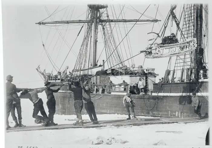 Framed Print : Men Lowering a Motor Sledge for Ship Framed Print : Men Lowering a Motor Sledge for Ship