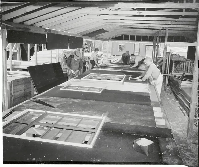 Framed Print : Men Making Wall Panels and Roof Trusses for Houses Framed Print : Men Making Wall Panels and Roof Trusses for Houses