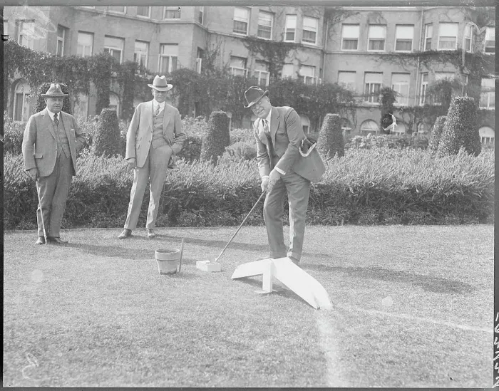 Framed Print : Men Playing Miniature Golfing