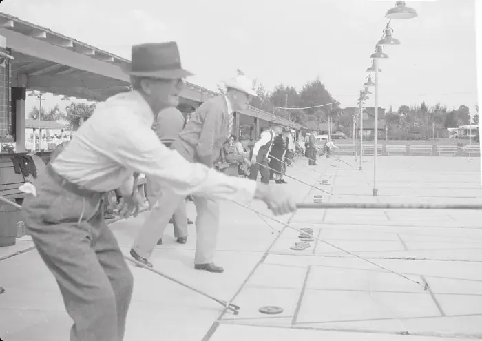 Framed Print : Men Playing Shuffleboard Framed Print : Men Playing Shuffleboard