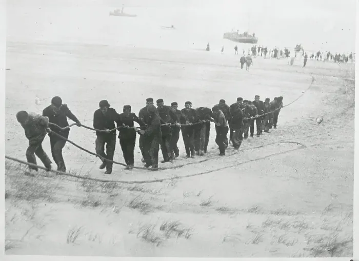 Framed Print : Men Pulling Cable on Shoreline Framed Print : Men Pulling Cable on Shoreline