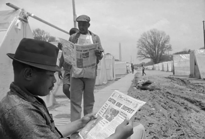 Framed Print : Men Reading Paper with Headline of James Earl Ray Capture Framed Print : Men Reading Paper with Headline of James Earl Ray Capture