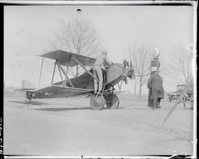 Framed Print : Men Refueling an Airplane From Fuel Pump Framed Print : Men Refueling an Airplane From Fuel Pump
