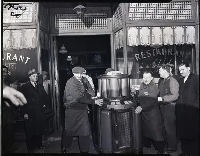 Framed Print : Men Removing Juke Box From Bar Framed Print : Men Removing Juke Box From Bar