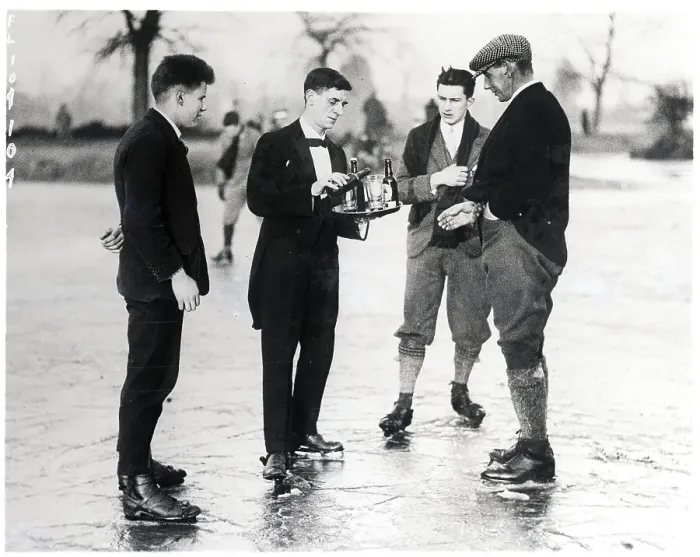 Framed Print : Men Served Drinks While Ice Skating Framed Print : Men Served Drinks While Ice Skating
