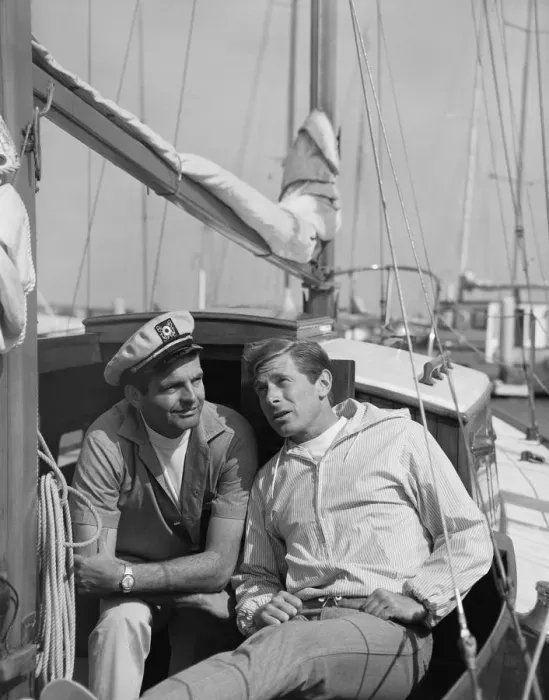 Framed Print : Two men sitting in boat, smiling Framed Print : Two men sitting in boat, smiling