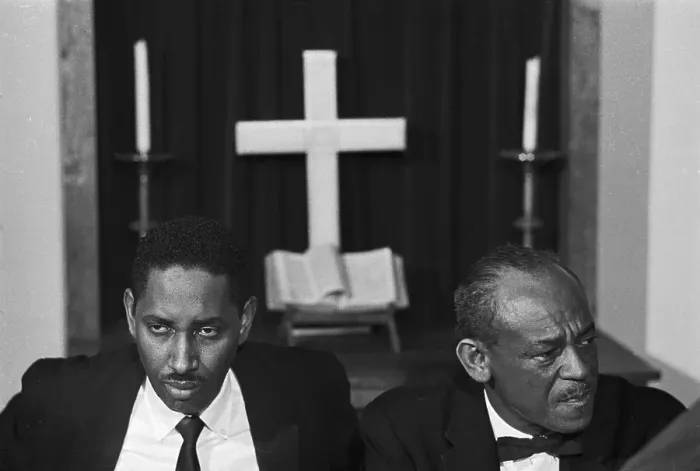 Framed Print : Two Men Sitting in Front of Cross Framed Print : Two Men Sitting in Front of Cross