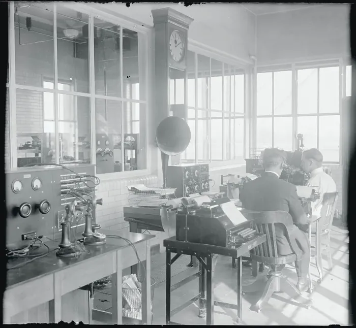 Framed Print : Men Sitting in Radio Room Framed Print : Men Sitting in Radio Room