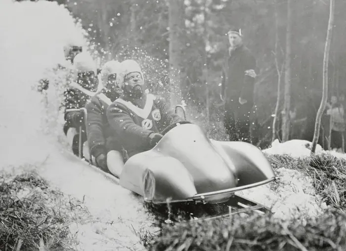 Framed Print : Men in Sled in Action Framed Print : Men in Sled in Action