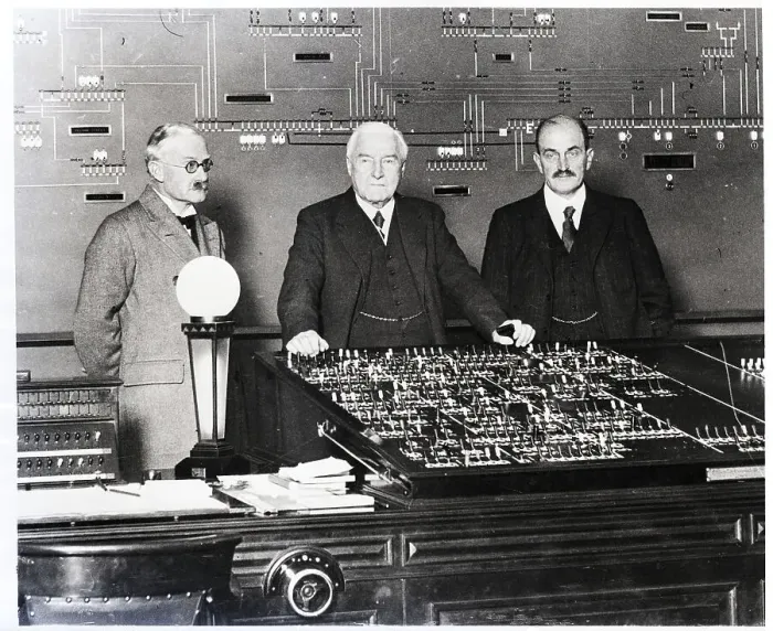 Framed Print : Men Standing at Control Board Framed Print : Men Standing at Control Board