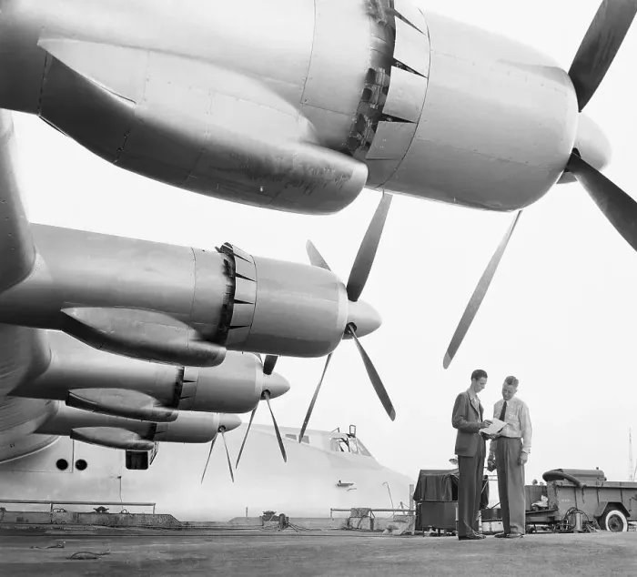 Framed Print : Two Men Standing by Wing of Hughes Flying Boat Framed Print : Two Men Standing by Wing of Hughes Flying Boat