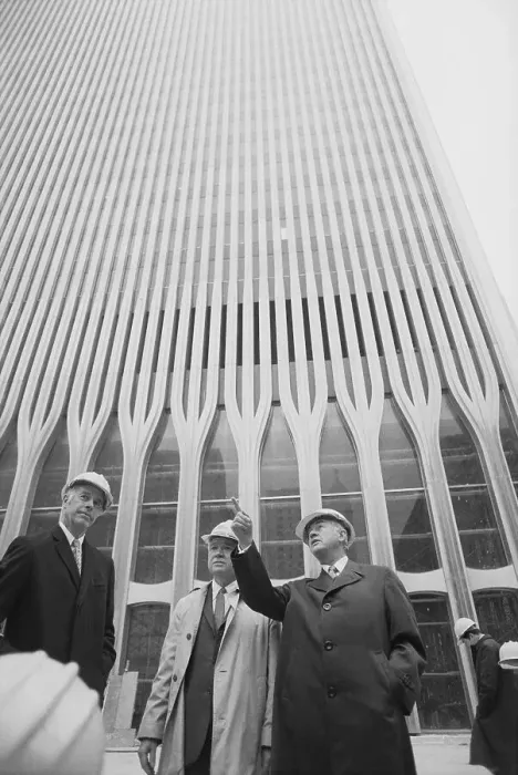 Framed Print : Men Standing in Front of World Trade Center Tower Framed Print : Men Standing in Front of World Trade Center Tower