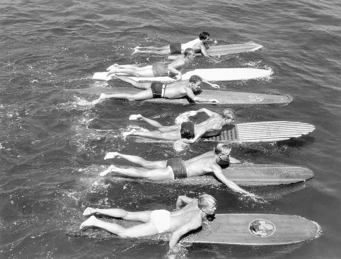 Framed Print : Men Swimming on Surfboards Framed Print : Men Swimming on Surfboards