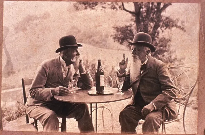 Framed Print : Two Men Talking over Wine Framed Print : Two Men Talking over Wine