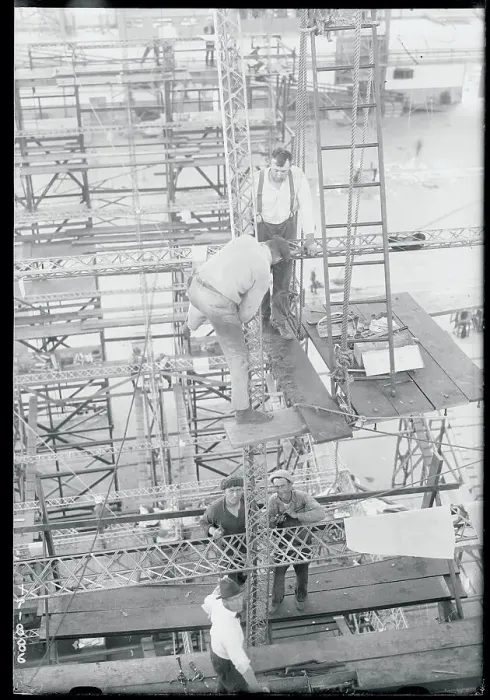 Framed Print : Men Working with Air Ship Materials Framed Print : Men Working with Air Ship Materials