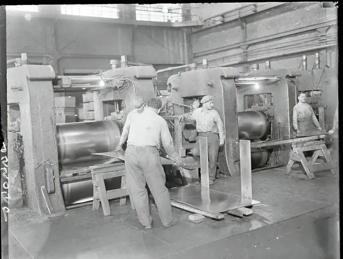 Framed Print : Men Working with Automobile Sheets