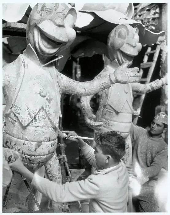 Framed Print : Men Working on Carnival Creatures by Pupazzo Framed Print : Men Working on Carnival Creatures by Pupazzo