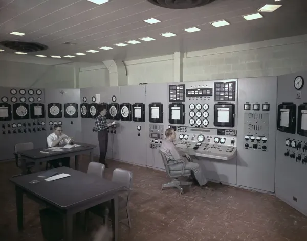 Prints of Men Working in Control Room of Nuclear Power Plant