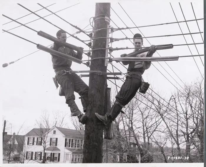 Framed Print : Men Working on Electrical Wires from Poles