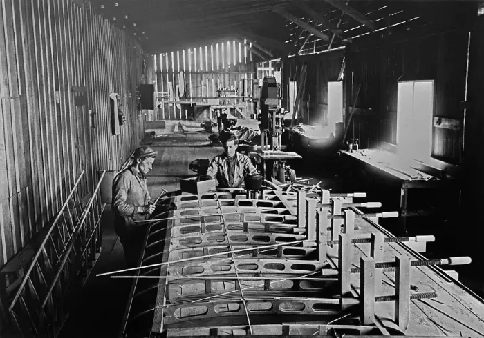 Framed Print : Men Working in Military Aircraft Plant Framed Print : Men Working in Military Aircraft Plant
