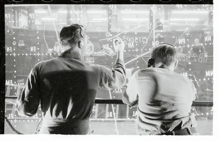 Framed Print : Men Writing on a Plotting Board Framed Print : Men Writing on a Plotting Board