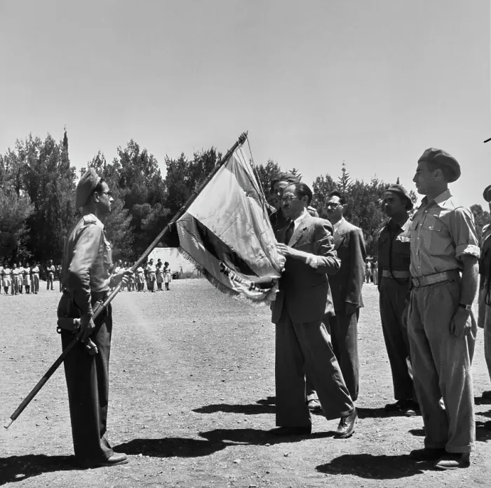 Framed Print : Menachem Begin With Irgun Flag Framed Print : Menachem Begin With Irgun Flag