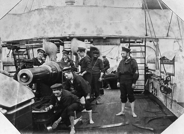 Mens Work. 1876: Barefoot sailors cleaning guns on board HMS Firefly
