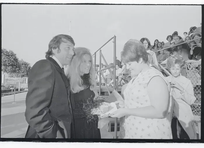 Framed Print : Meredith McRae and Husband Signing Autographs Framed Print : Meredith McRae and Husband Signing Autographs