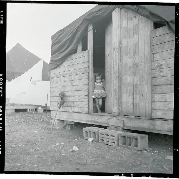 Framed Print : Mexican Child Peekingout of Hut