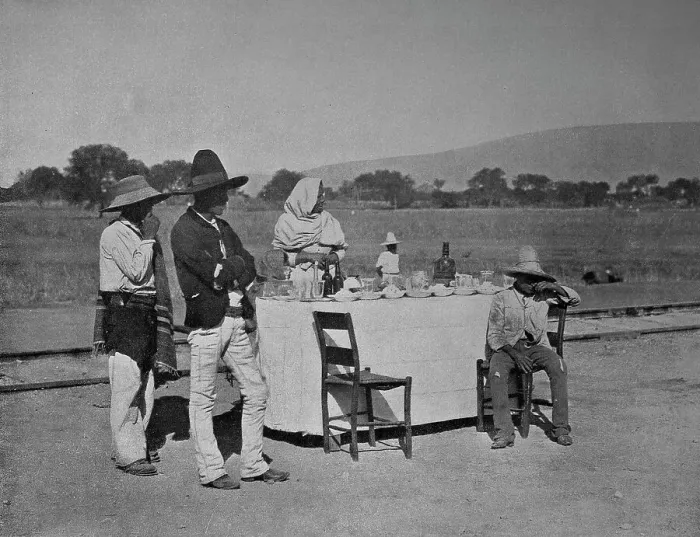 Framed Print : Mexico, coffee at the Mexican Central Railroad, woman in Mexican traditional costume offers the traveller typical drinks and cakes, ca 1880, historical, digital reproduction of a 19th century original, original date not known Framed Print : Mexico, coffee at the Mexican Central Railroad, woman in Mexican traditional costume offers the traveller typical drinks and cakes, ca 1880, historical, digital reproduction of a 19th century original, original date not known