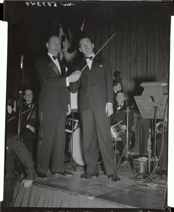 Framed Print : Meyer Davis Passing His Music Baton to His Servant Framed Print : Meyer Davis Passing His Music Baton to His Servant