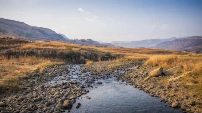 Framed Print : Mhlwazini river near Cathedral Peak in Drakensberg mountains