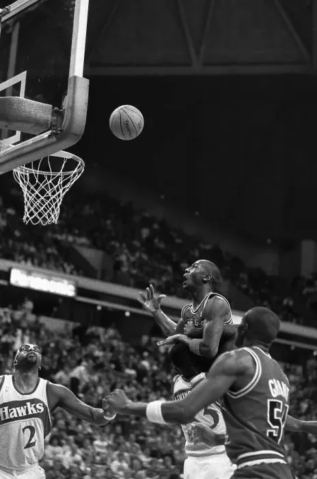 Framed Print : Michael Jordan in Action Against the Atlanta Hawks Framed Print : Michael Jordan in Action Against the Atlanta Hawks