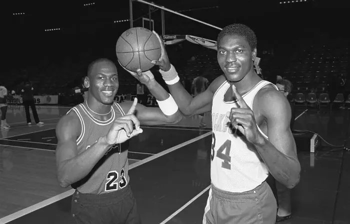 Framed Print : Michael Jordan and Akeem Olajuwon in Rookie Seasons Framed Print : Michael Jordan and Akeem Olajuwon in Rookie Seasons