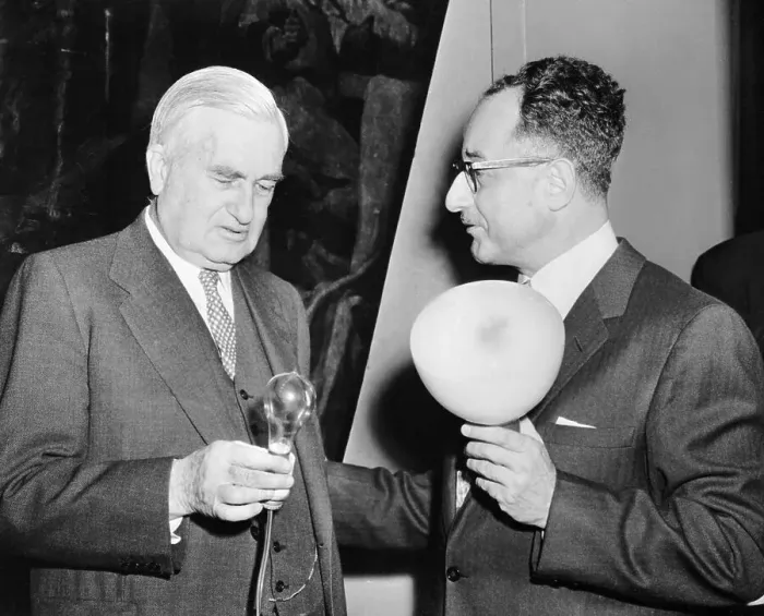 Framed Print : Michel Macksoud and Charles Edison Comparing Light Bulbs Framed Print : Michel Macksoud and Charles Edison Comparing Light Bulbs