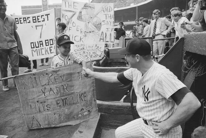 Framed Print : Mickey Mantle Greeting a Young Fan in Miniature Baseball Uniform Framed Print : Mickey Mantle Greeting a Young Fan in Miniature Baseball Uniform